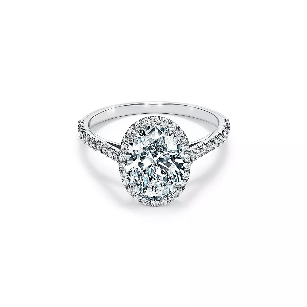 Oval-cut Halo Engagement Ring with Diamond Band