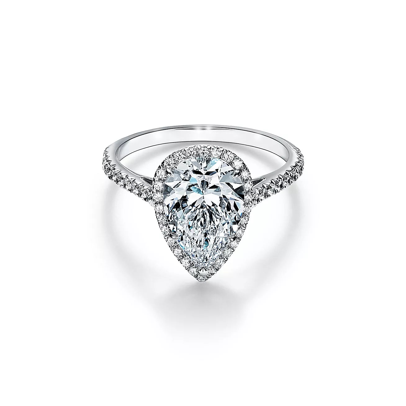 Pear-shaped Halo Engagement Ring with Diamond Band